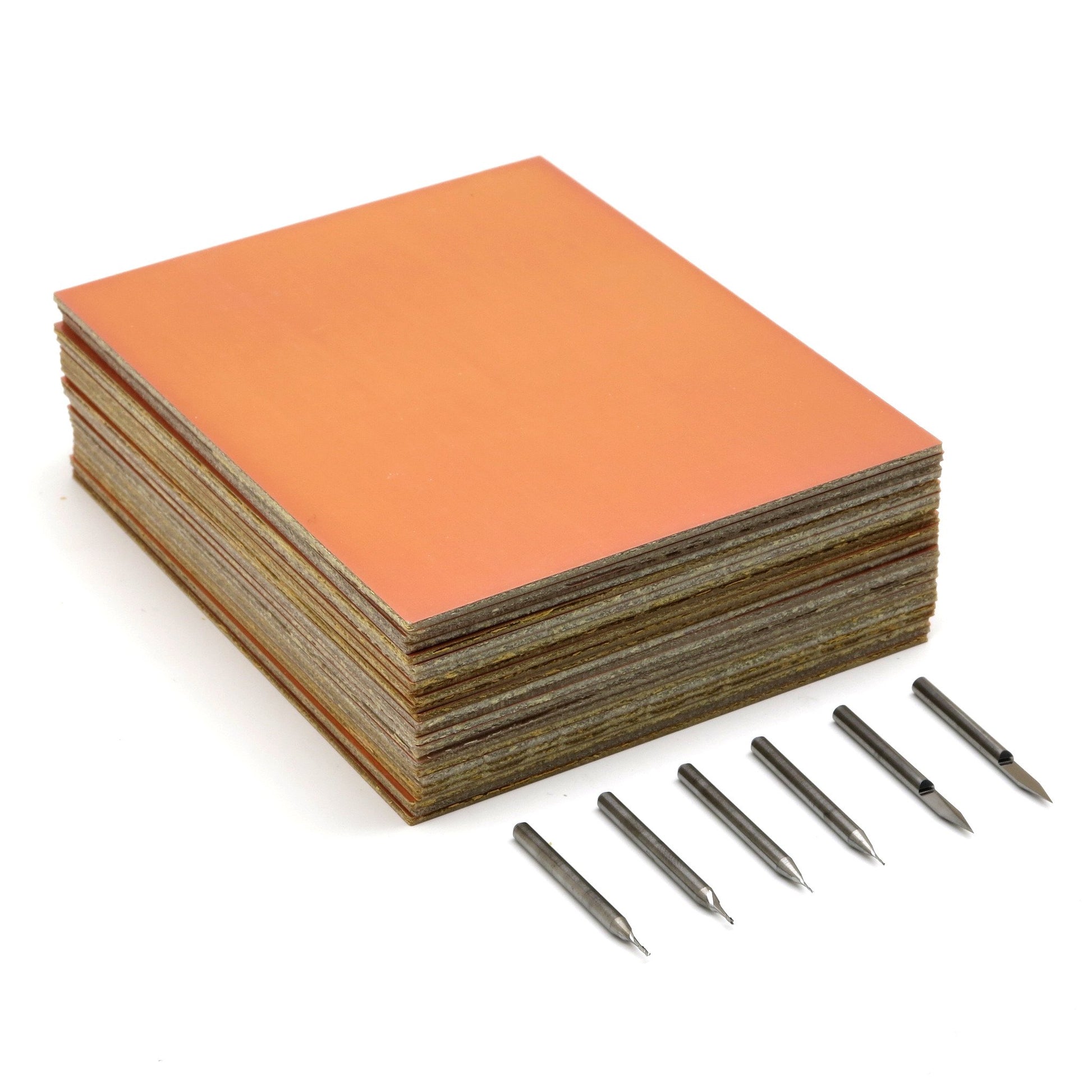 In this electronics bundle you get a set of carbide end mills for milling circuit boards and a 25-pack of both single and double-sided FR-1 circuit board blanks to mill with your desktop CNC machine.